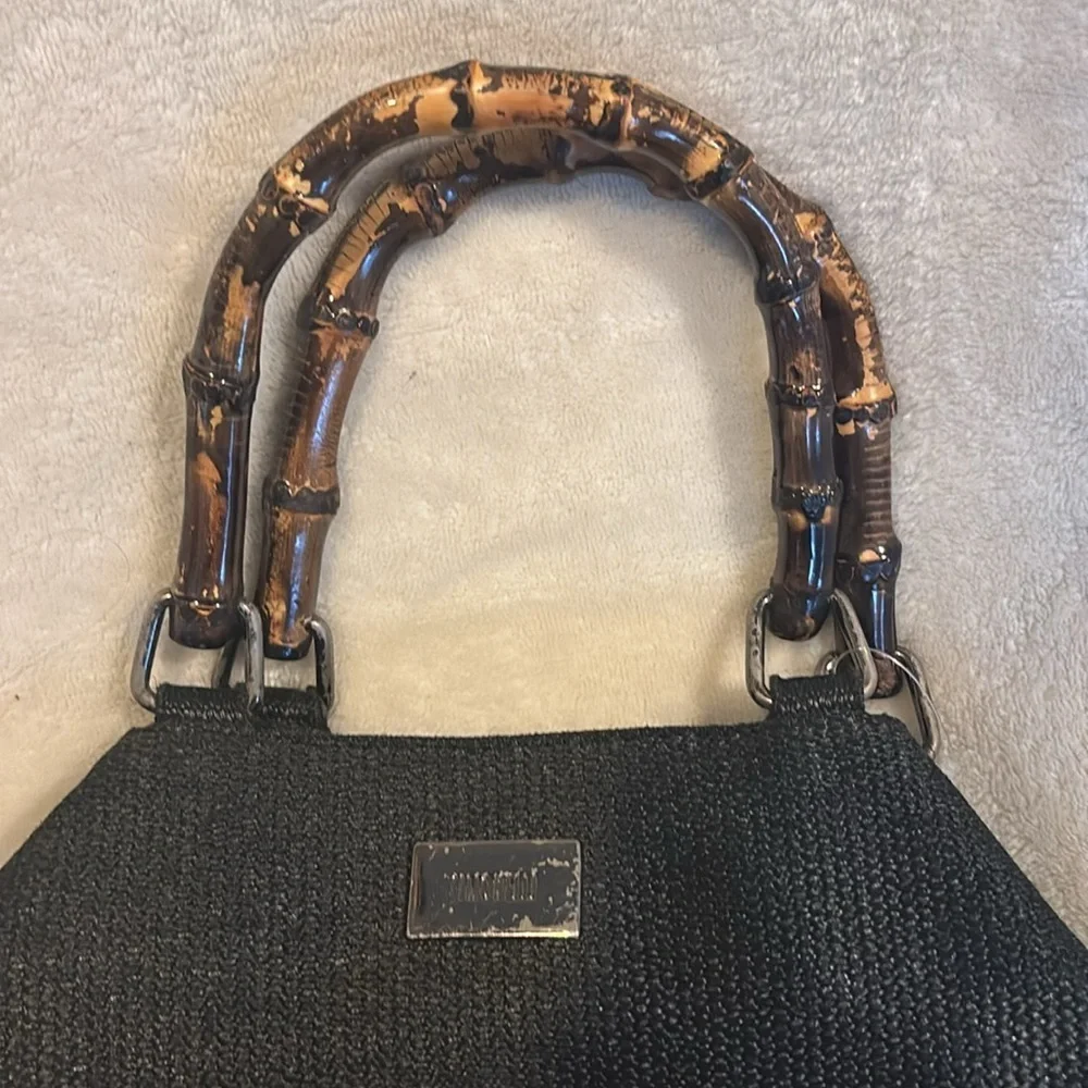 SIMONELLI BRAND BLACK HAND BAG WITH BAMBOO LIKE(ACRYLIC) HANDLES SNAP CLOSURE